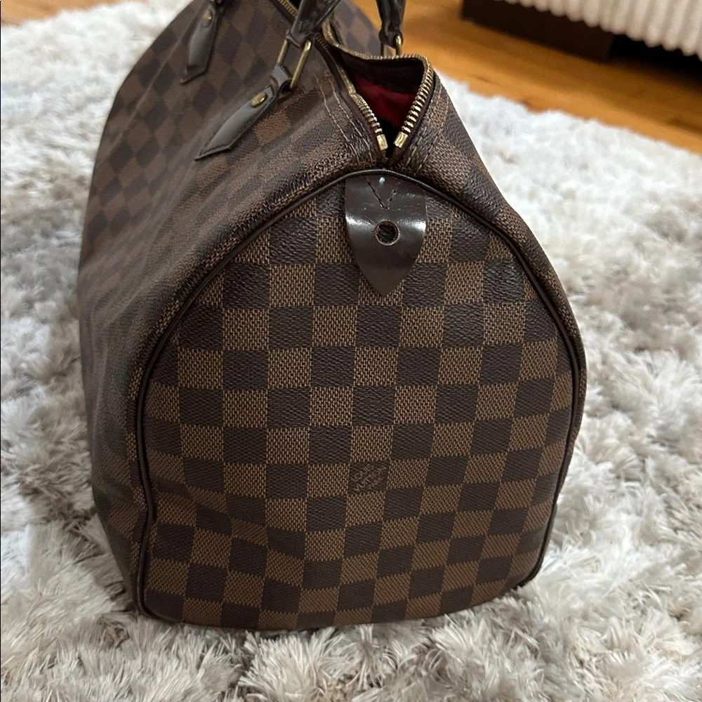 Louis Vuitton
Damier Ebene Speedy 35 - Picture 10 of 11